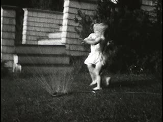 Playing in Sprinkler - Home Movie Clips